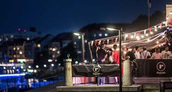 Rhypark riverside terrace at night